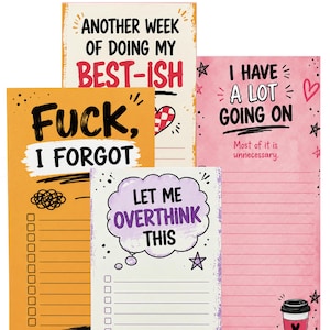 May include: Four rectangular paper notepads with colorful designs and text. The orange pad says FUCK, I FORGOT. The cream pad says ANOTHER WEEK OF DOING MY BEST-ISH. The pink pad says I HAVE A LOT GOING ON. The purple pad says LET ME OVERTHINK THIS.