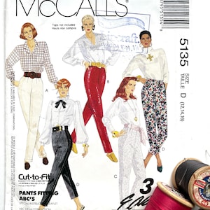 May include: A sewing pattern for trousers with a white background and illustrations of four women wearing different styles of trousers. The pattern number is 5135 and the size is D (12, 14, 16). The text "Cut-to-Fit Pants Fitting ABC's" is printed on the pattern.