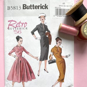 May include: A vintage sewing pattern envelope for a dress, featuring three women wearing different styles of dresses. The pattern is from Butterick and is labelled "Retro '56". The pattern number is B5813.