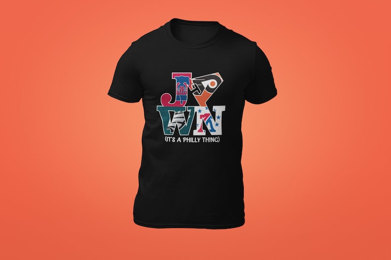 May include: Black t-shirt with a graphic of the letters "J-Y-W-N" formed by logos of Philadelphia sports teams. The text "(IT'S A PHILLY THING)" is below the graphic.