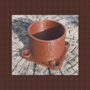 May include: A brown plastic 3D printed pipe fitting with a square base and a round opening. The fitting has a textured surface.