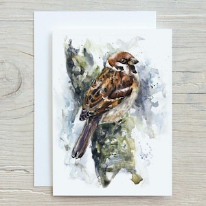 May include: Watercolor painting of a sparrow perched on a branch. The sparrow is brown and white with a long tail. The background is a soft blue with splashes of green and white.