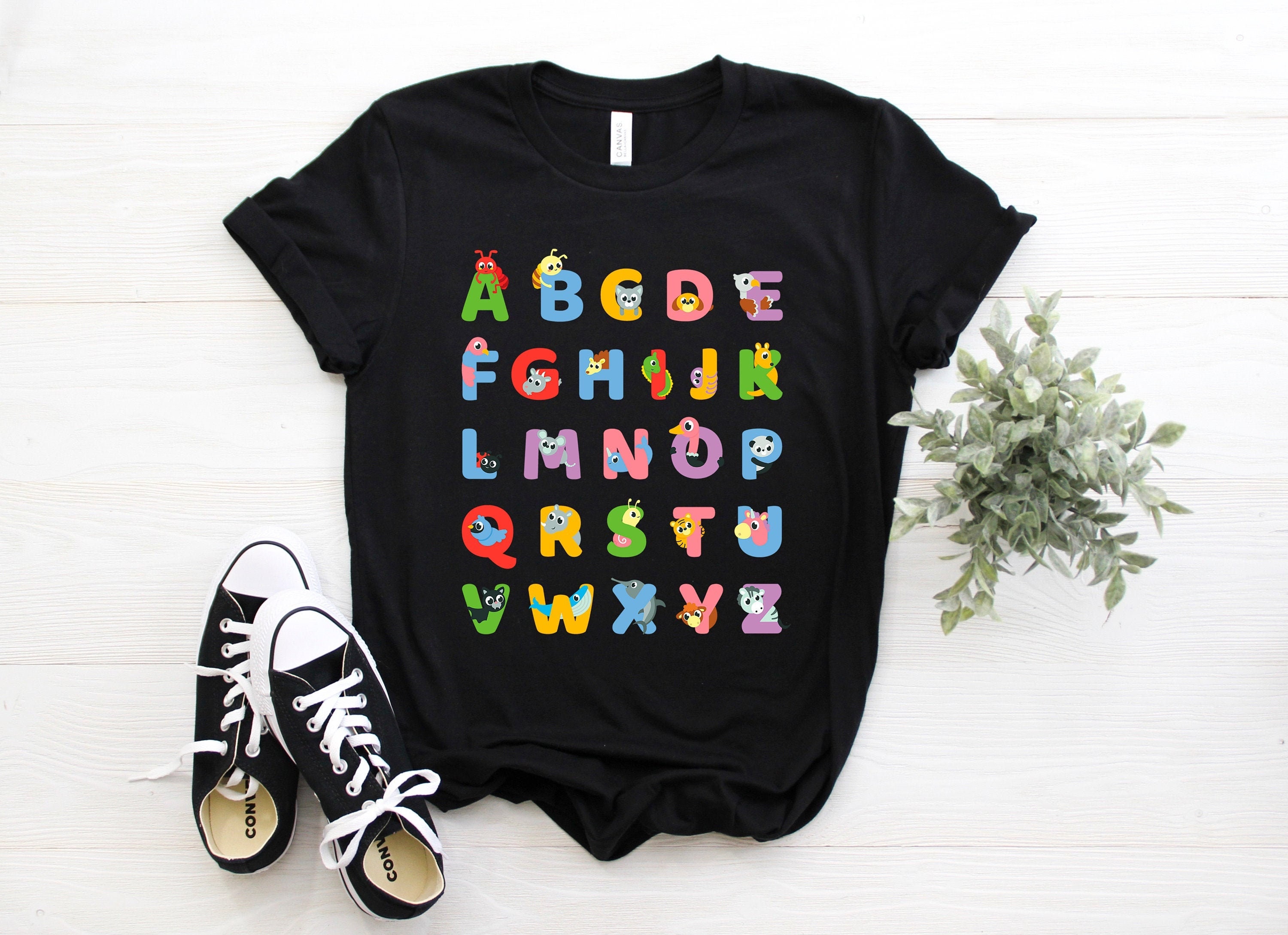 Hand drawn funny alphabet lore, english fonts with faces Kids T