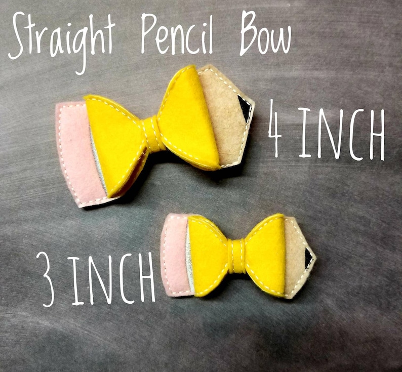 May include: Two felt pencil bows, one 4 inches and one 3 inches long, with yellow, pink, and tan colors. The bows have a pencil design with a black tip and are stitched with white thread. The text "Straight Pencil Bow" is above.