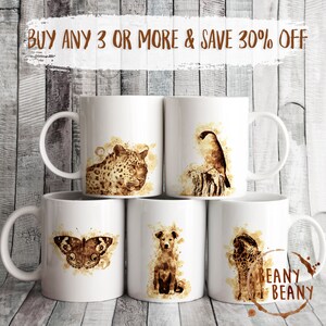 May include: White ceramic mugs with animal illustrations in shades of brown. The mugs feature a leopard, a bird, a butterfly, a dog, and a giraffe. Text at the top reads "BUY ANY 3 OR MORE & SAVE 30% OFF". The mugs have a curved handle.