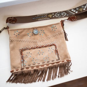 Leather cross body bag/purse. Tan with turquoise accents and studded cross body strap. Multi pocketed, High Quality. Southwest style