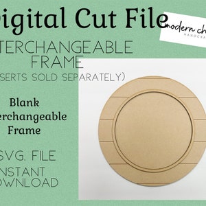 May include: A digital cut file for a blank interchangeable frame. The frame is round and has a woodgrain texture. The file is available for instant download.  "Digital Cut File", "Interchangeable Frame", "Inserts Sold Separately", "Blank", "Interchangeable Frame", "SVG. File", "Instant Download" are visible in the image.