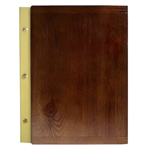 May include: A brown wooden menu cover with a light beige leather spine and brass rivets. The cover has a wood grain pattern.