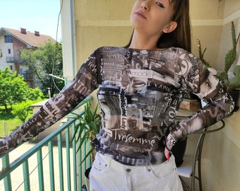 Body de malla transparente: Blusa de tul con estampado bohemio en blanco y negro