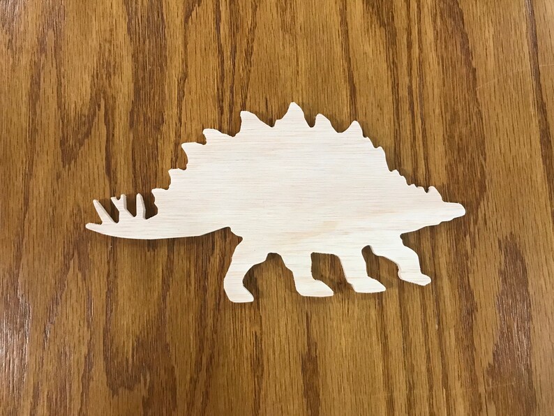 painted wooden dinosaur cutouts