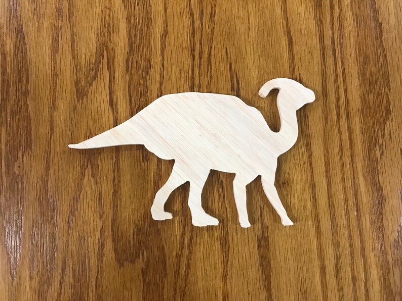 painted wooden dinosaur cutouts
