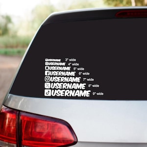 May include: A white vinyl decal featuring seven social media icons followed by the text USERNAME, with corresponding widths listed from 3 inches to 9 inches. The decal is displayed on the rear window of a vehicle above a red taillight.