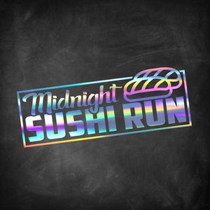 May include: A holographic sticker with the text "Midnight Sushi Run" in a white outline with a rainbow gradient fill. A stylized sushi roll is above the text.