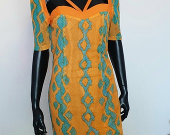 Durf te schitteren in onze extravagante oranje-oranje jurk met turkooismotieven, turkooismotieven, unieke dameskleding, jurk voor speciale gelegenheden