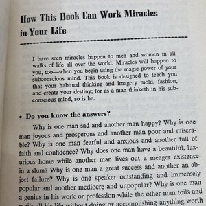 May include: Open book page with the title "How This Book Can Work Miracles in Your Life." The text discusses the power of the subconscious mind and poses questions about life's disparities. The page is white with black text.