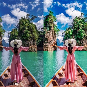 May include: A woman in a pink dress and a white sun hat stands in a longtail boat on a turquoise lake. The boat is surrounded by lush green trees and towering rock formations. The sky is blue with white clouds.