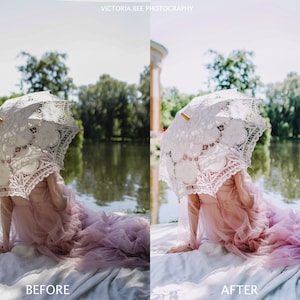 Puede incluir: Una mujer con un vestido rosa se sienta en una manta blanca con una sombrilla de encaje blanco sobre su cabeza. El fondo es un estanque con &aacute;rboles verdes y un edificio en la distancia.