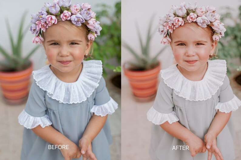 May include: A young girl wearing a light blue dress with a white lace collar and sleeves. She is wearing a flower crown with pink and purple flowers. The girl is smiling and looking at the camera.