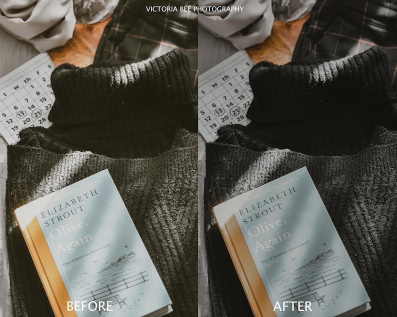 May include: A close-up of a book titled "Olive, Again" by Elizabeth Strout, lying on a black sweater. The book is on a wooden surface with a calendar and a plaid fabric in the background.