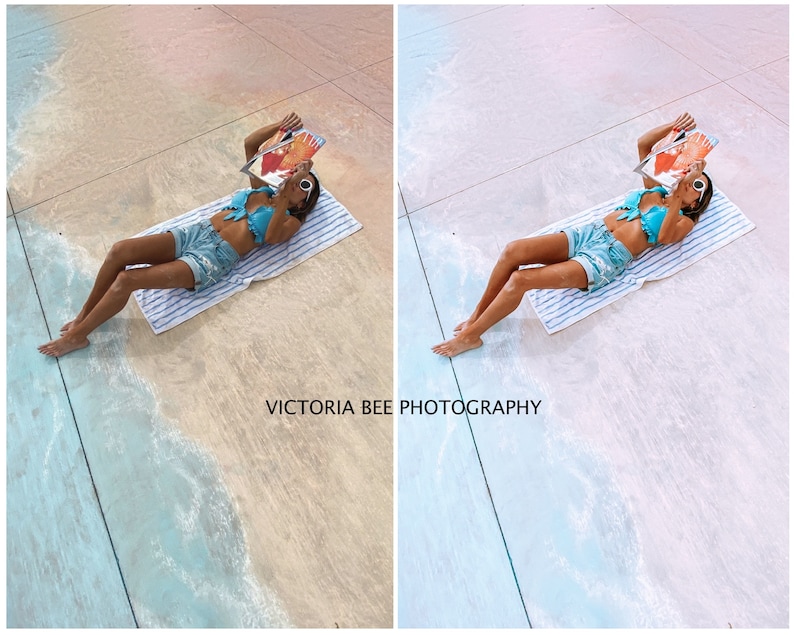 May include: A woman wearing a blue bikini top and denim shorts lies on a white towel on a painted beach scene. She is reading a magazine and the text "VICTORIA BEE PHOTOGRAPHY" is visible on the ground.
