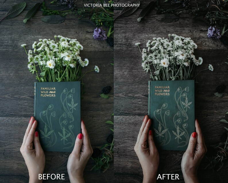 May include: A vintage green book titled "Familiar Wild Flowers" with gold lettering, held by hands against a dark wood background with white flowers.