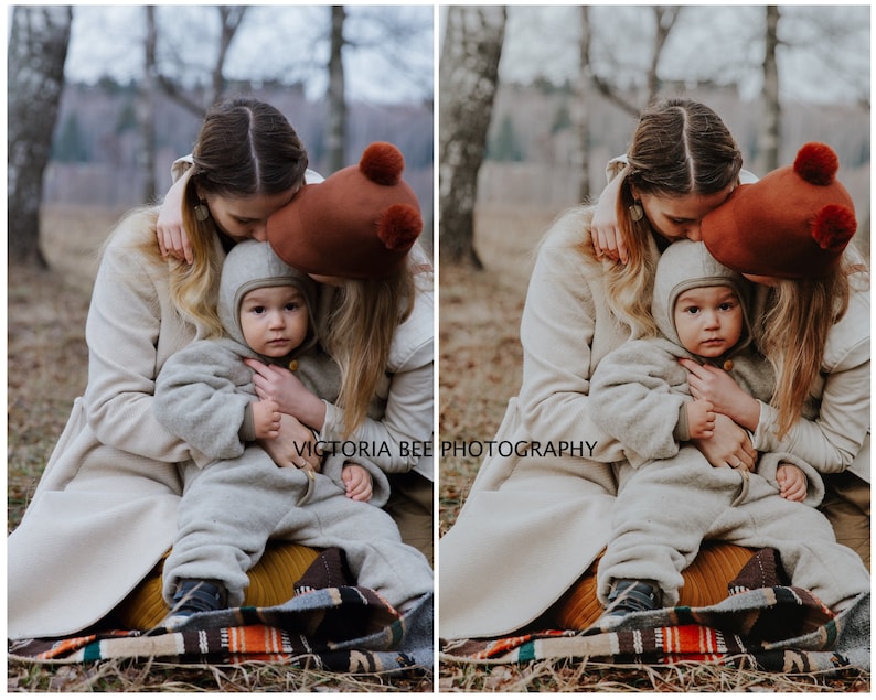May include: Two people are sitting on a blanket in a forest. One person is wearing a brown hat with pom-poms and is kissing a child on the head. The child is wearing a gray hooded jumpsuit. The text "VICTORIA BEE PHOTOGRAPHY" is visible in the image.