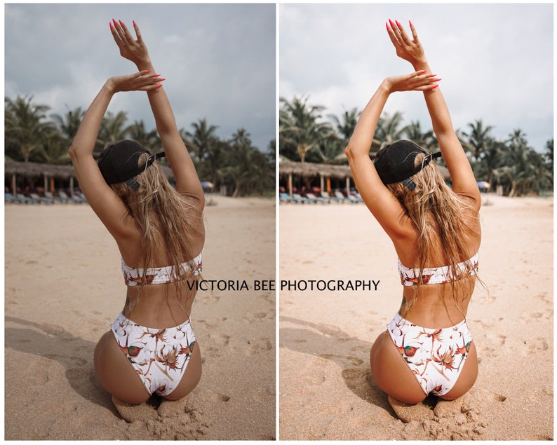 May include: A woman wearing a white and brown floral print bikini top and matching high-waisted bikini bottoms sits on a sandy beach with her arms raised above her head. She is wearing a black baseball cap and has her blonde hair down. The text "VICTORIA BEE PHOTOGRAPHY" is visible in the lower right corner of the image.