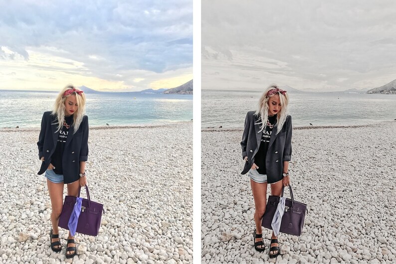 May include: A woman wearing a black blazer, a black t-shirt with white text, denim shorts, and a red bandana on her head. She is carrying a purple handbag with a light purple scarf hanging out of it. She is standing on a pebble beach with a body of water in the background.