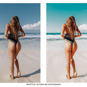 May include: A woman in a black swimsuit stands on a white sandy beach with blue ocean waves in the background.