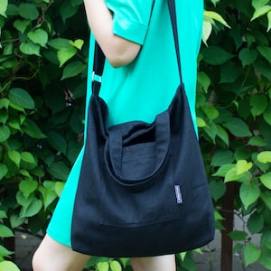 Schwarze Leinen Crossbody Tasche mit Griffen & Taschen