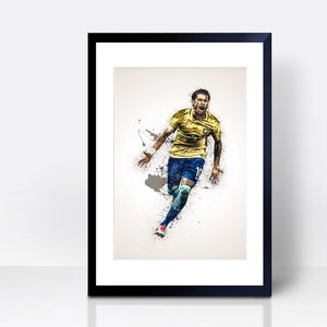 May include: A framed print of a soccer player in a yellow and blue uniform, running and celebrating a goal. The player is in mid-air, with a dynamic pose and a determined expression on his face. The background is a white canvas with splashes of paint.