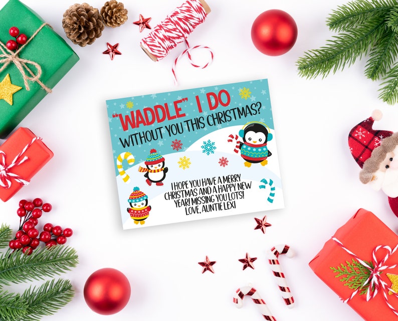 May include: A blue and white Christmas card with a penguin illustration and the text "Waddle" I do without you this Christmas? I hope you have a merry Christmas and a happy new year! Missing you lots! Love, Auntie Lexi"