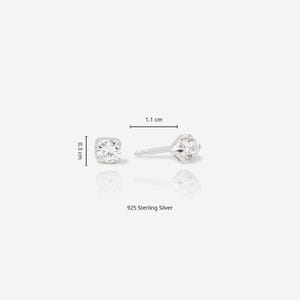 May include: A pair of 925 sterling silver stud earrings featuring a clear round gemstone. The earrings measure 0.3 cm in diameter and 1.1 cm in length, as indicated by the visible measurement lines and text labels included in the image.
