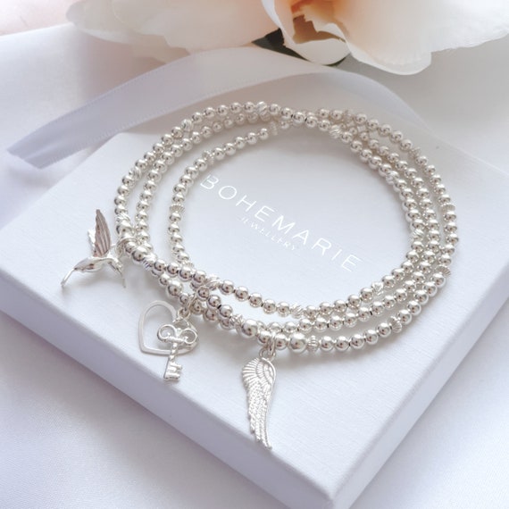 Stretch Hecho a mano con cuentas de plata y estrella del encanto del corazón pulsera de apilamiento