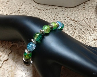 Green blue black white bracelet with crackle glass beads and silver beads