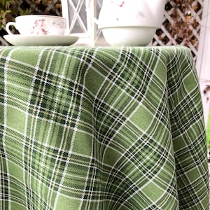 Green tartan plaid tablecloth for indoor and outdoor kitchen decor. Durable table linen for dining table. Round or rectangular tablecloth