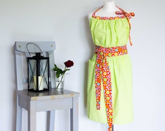 Bright green full apron with a colorful rainbow belt for women