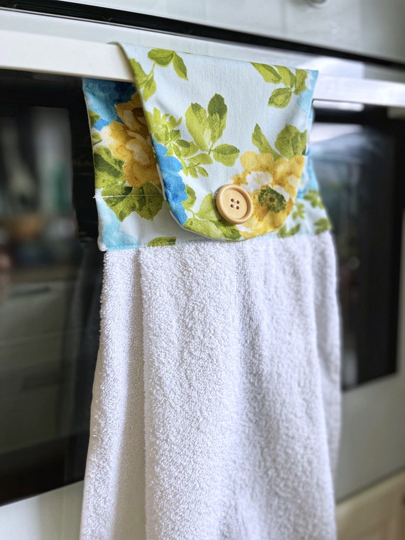 Kitchen towel with button discount