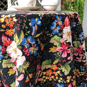 Flowers on black tablecloth for floral kitchen decor. Durable table linen for dining table. Summer flowers tablecloth in multiple sizes.