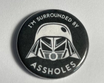 Dark Helmet from Spaceballs!  Im surrounded by! magnets or pin back buttons