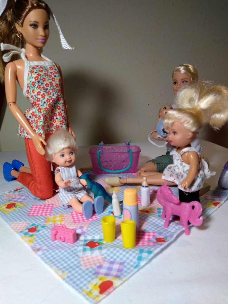 barbie doll with family