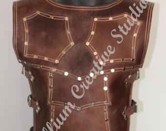 chest armor, chest guard, leather armor + shoulder armor (optional)