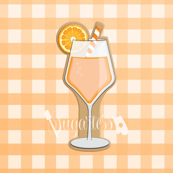 Citric Champagne Mimosa Cocktail Glass with Orange or Lemon Slice and Straw Cookie Cutter
