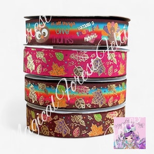 May include: Four spools of decorative ribbon with autumn designs. The top spool has an owl and the words "in all things give thanks". Other spools feature gold, orange, and green leaf patterns on brown and pink backgrounds.