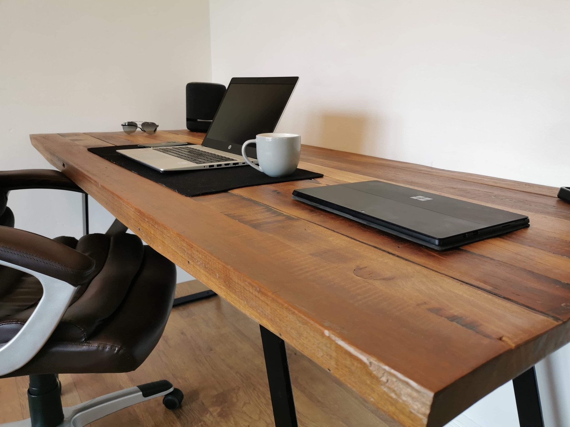 Steel office table with outlet wooden top