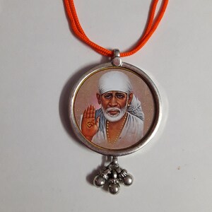 Handmade 92.5 Sterling Silver Glass Framed Hindu Deity Sab Ka Malik Ek Hai Sai Baba Photo Print Beautiful Bell Pendant With Colour String