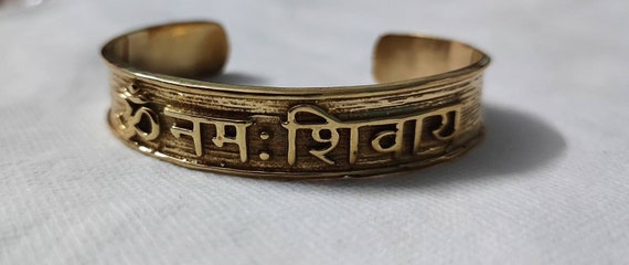 Amazon.com: Devotional Store Om Namah Shivaya Brass Adjustable Bangle  Bracelet - A4574: Clothing, Shoes & Jewelry
