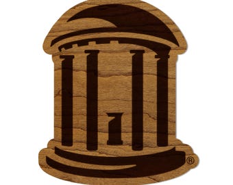 May include: A brown wooden cutout of the University of North Carolina at Chapel Hill's Old Well, a historic landmark on campus. The cutout is a popular souvenir for alumni and fans.