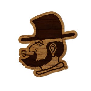 May include: A brown wooden sticker with a black silhouette of a man with a beard, wearing a hat and smoking a pipe. The sticker has a registered trademark symbol.