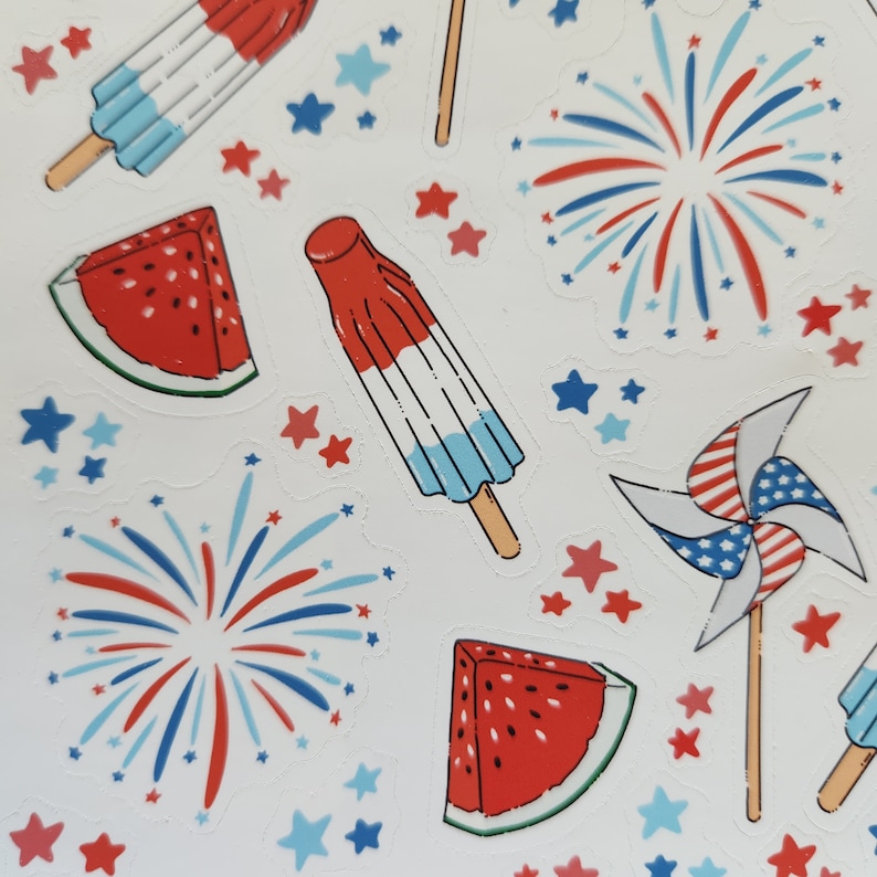 May include: A set of colourful stickers featuring watermelon slices, popsicles, fireworks, and a pinwheel. The stickers are perfect for adding a festive touch to any project.